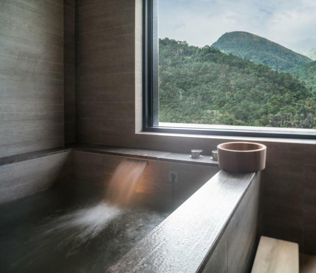 Mu Jiaoxi Hotel Экстерьер фото A modern onsen bath