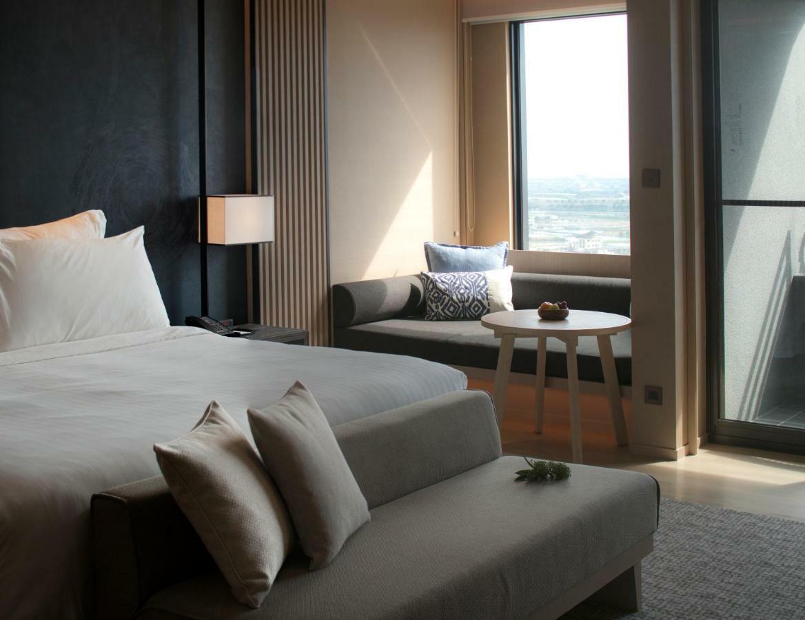 Mu Jiaoxi Hotel Экстерьер фото A bedroom at the hotel